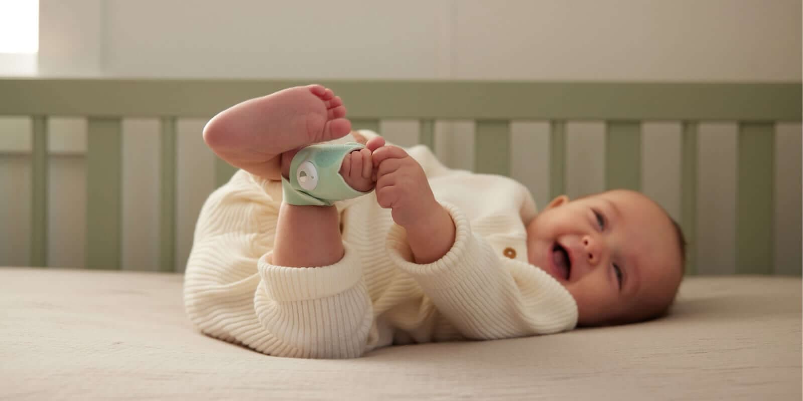 Owlet sock on a baby